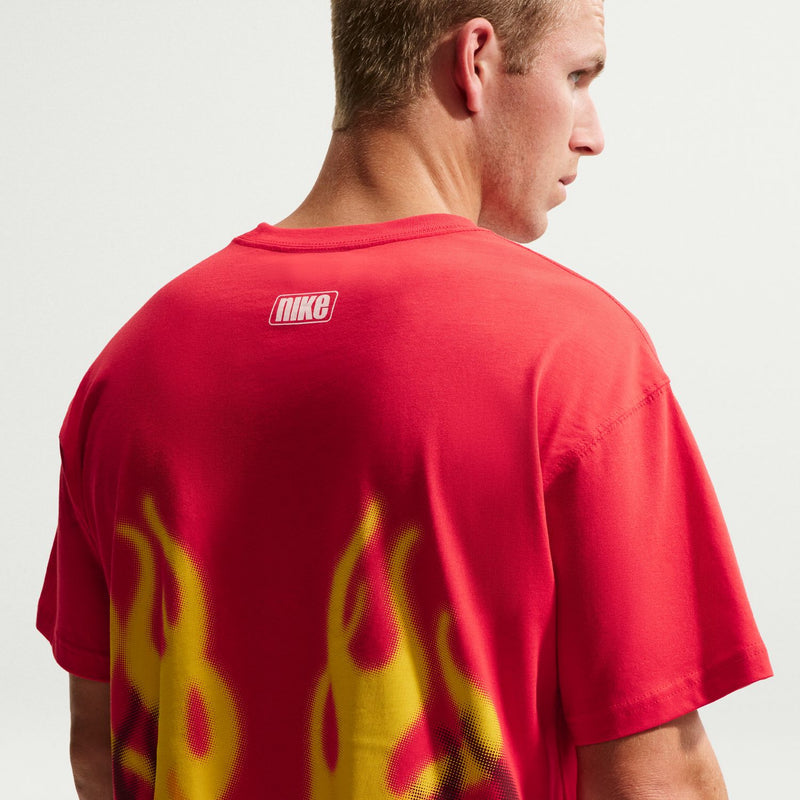 Men's red T-shirt back view with yellow flame graphic and NIKE logo