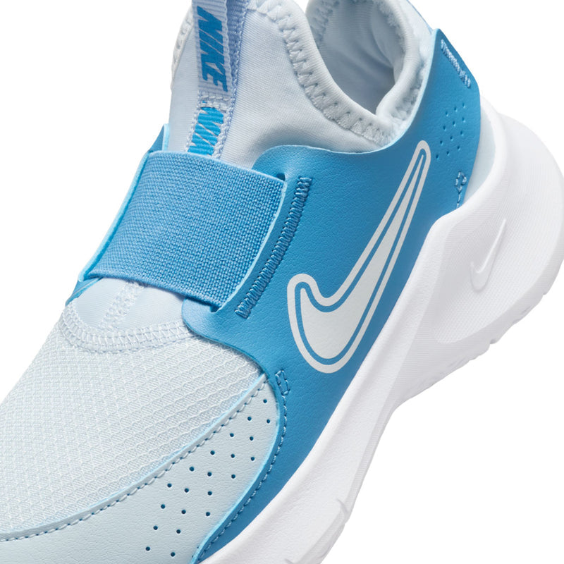 Kids light blue and white sneaker with elastic strap and Swoosh detail