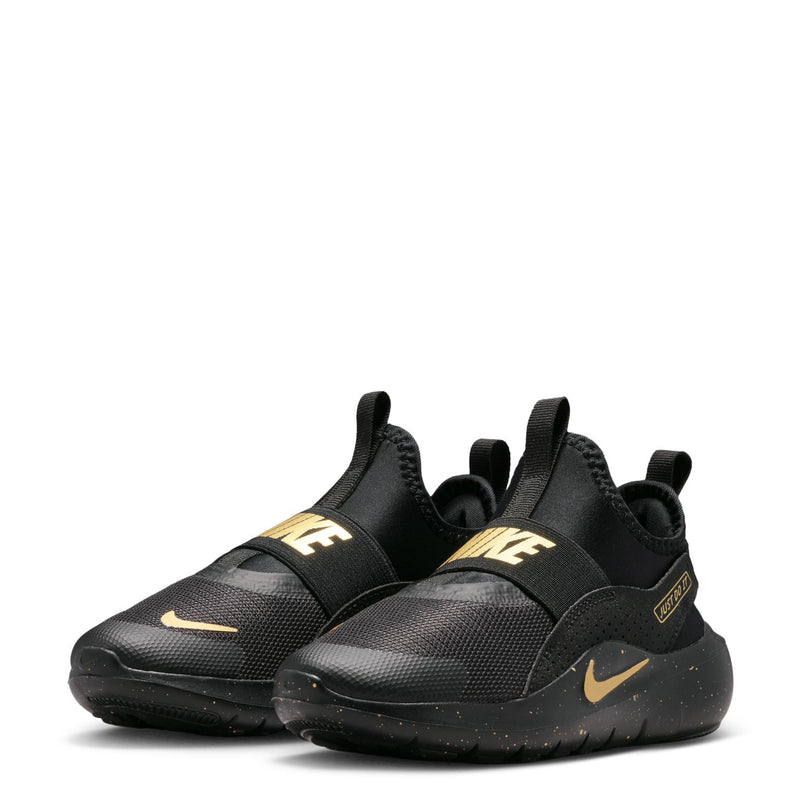 Kids' black low-top slip-on sneaker with gold accents and cushioned sole
