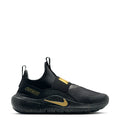 Youth black slip-on running shoe with gold accents and Nike Swoosh