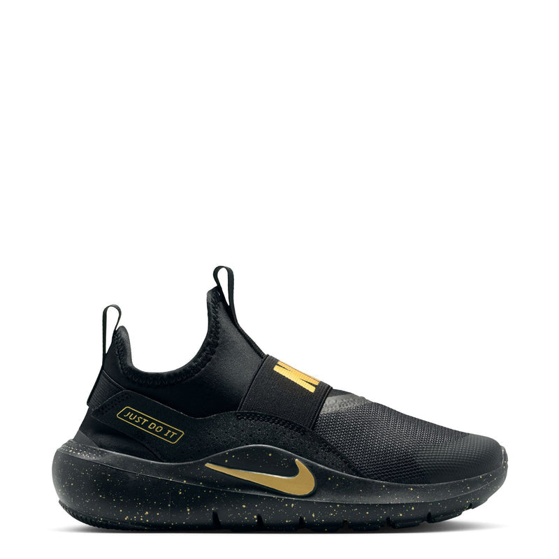 Youth black slip-on running shoe with gold accents and Nike Swoosh