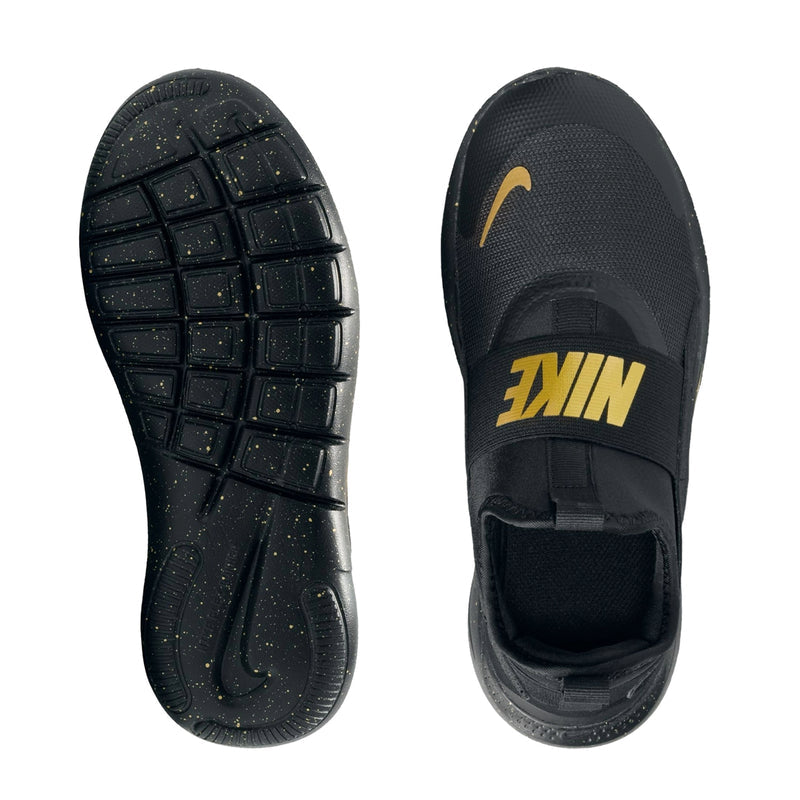 Youth black running shoe outsole view with grippy tread and traction pattern