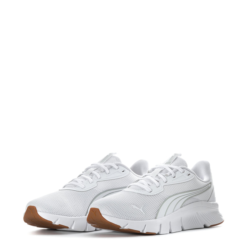 Pair of white knit running shoes for women in front angle with gum outsole