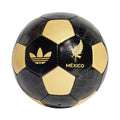 Black and gold Mexico soccer ball with trefoil logo and stitched panels