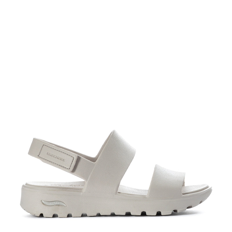 Women’s foam slide sandal in light neutral with two wide straps and tread sole