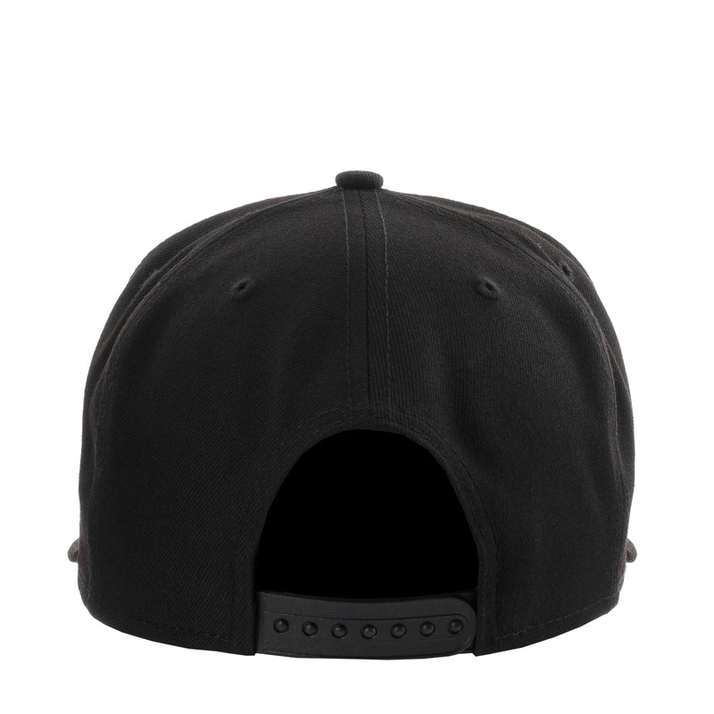 Black baseball cap back with ventilation eyelets and adjustable strap