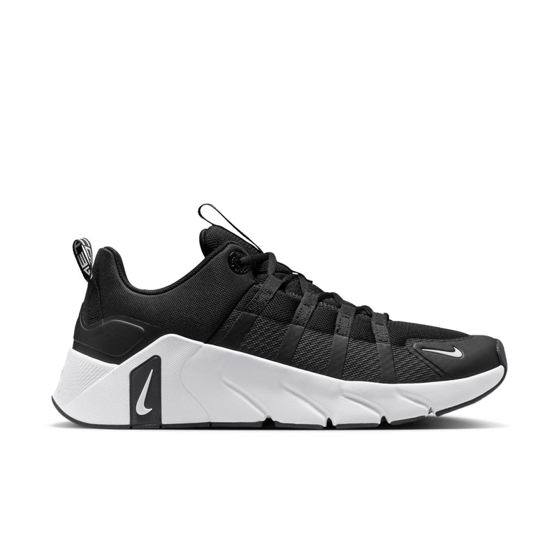 Men's black and white training sneaker with lace-up closure and cushioned midsole