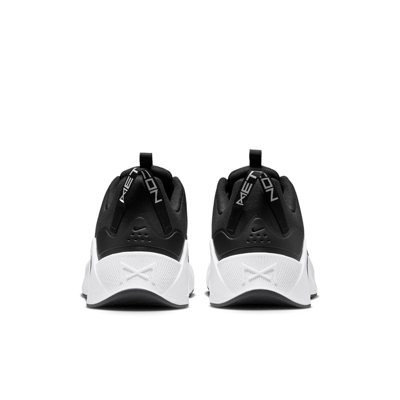 Men's black and white sneakers from the back, with cushioned heel and pull tab