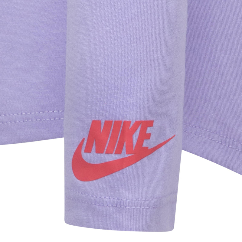 Kids lavender long-sleeve top sleeve cuff with red Nike swoosh