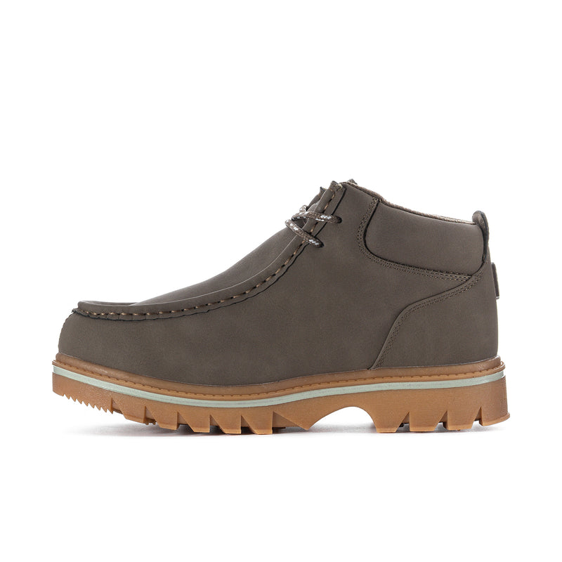 Men’s suede chukka boot with lace closure, side seam stitching, and gum outsole
