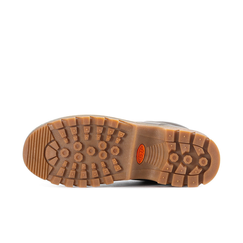 Men’s chukka boot outsole with rugged lug tread and orange logo patch