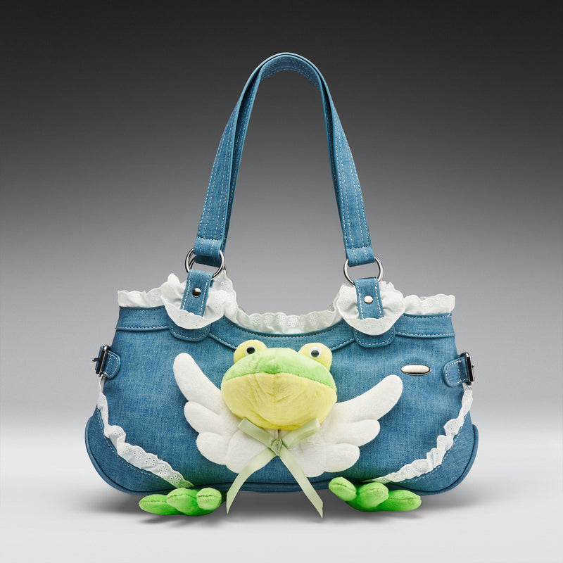 Denim handbag with a green frog design on a gray background