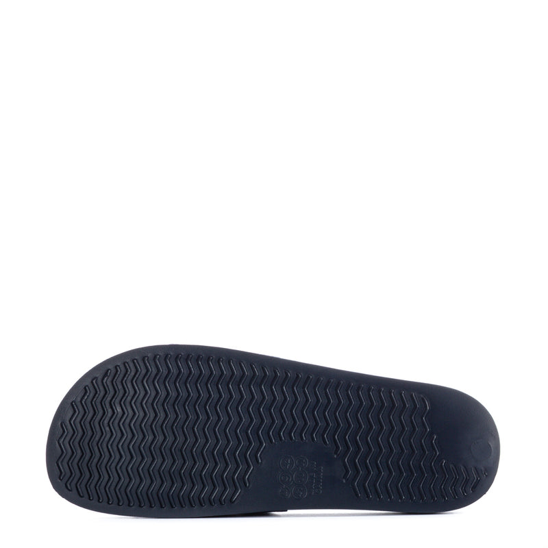 Dark navy outsole for men's slide sandals with textured tread pattern