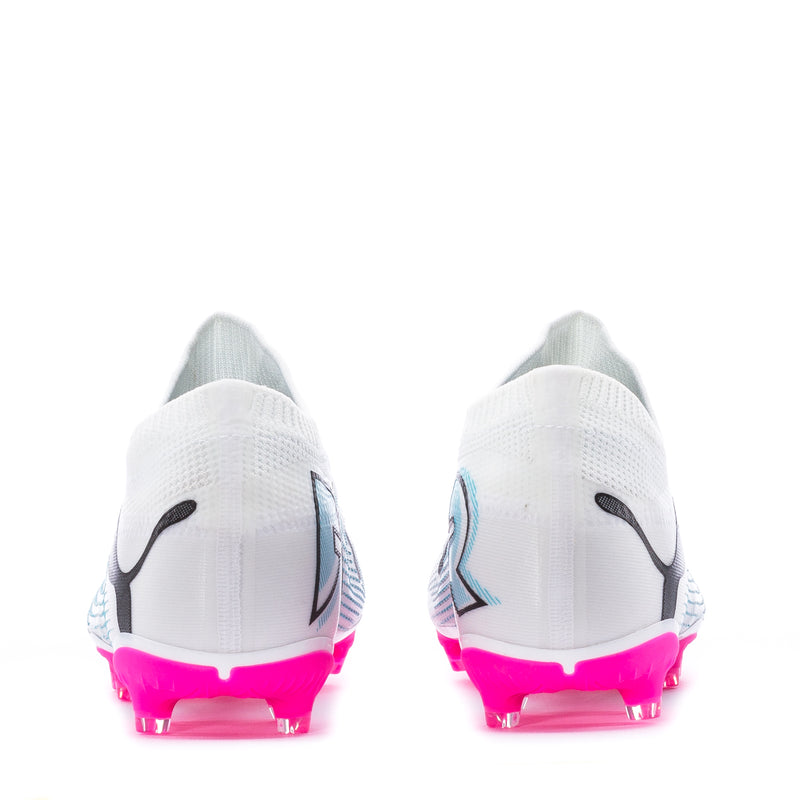 Men's white cleat heel view with blue accents and pink outsole studs, Puma logo