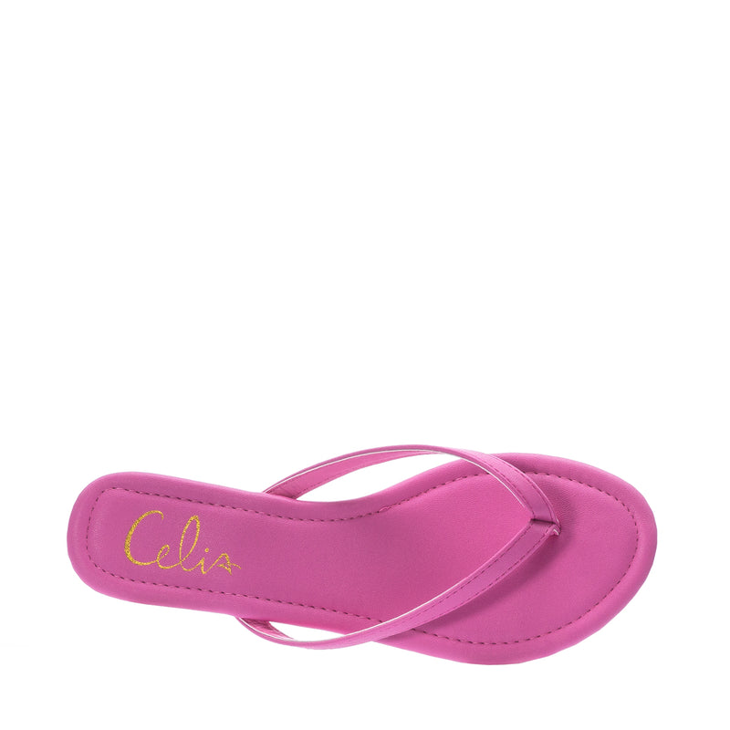 Women's fuchsia flip-flop sandals with script logo on the footbed