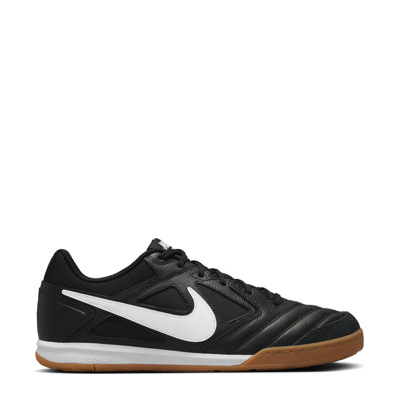 Black men's soccer shoe with white Nike swoosh and gum outsole, lace-up design