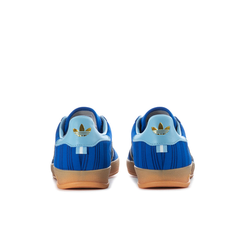 Men's blue indoor sneakers from the heel with adidas trefoil and gum sole