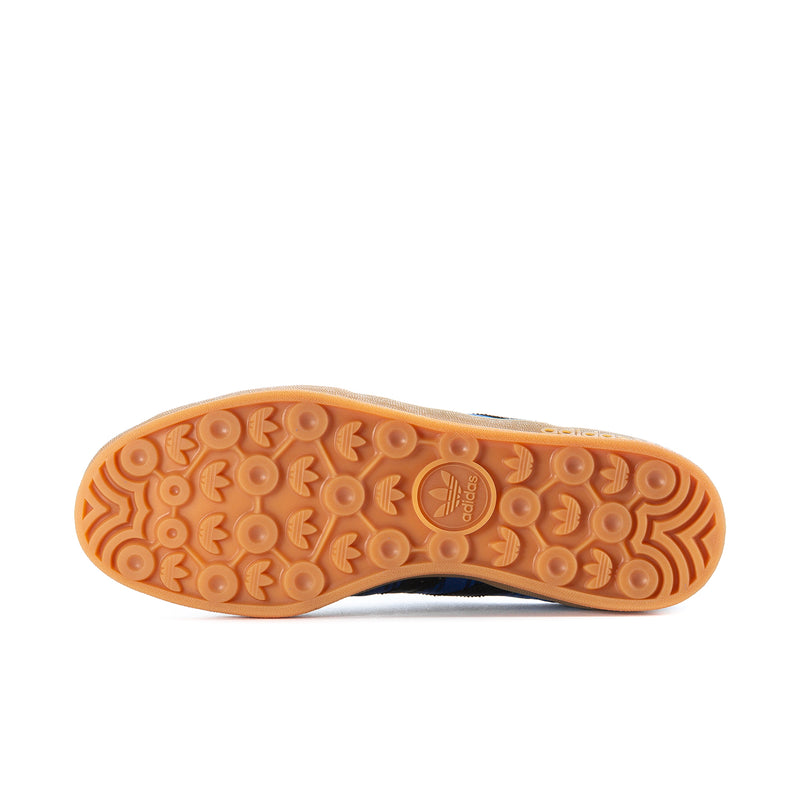 Men's indoor sneaker outsole with tan rubber tread pattern