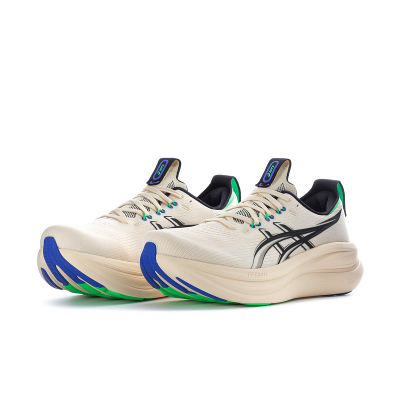 Men's running shoe, cream upper with black overlays, blue laces, green trim