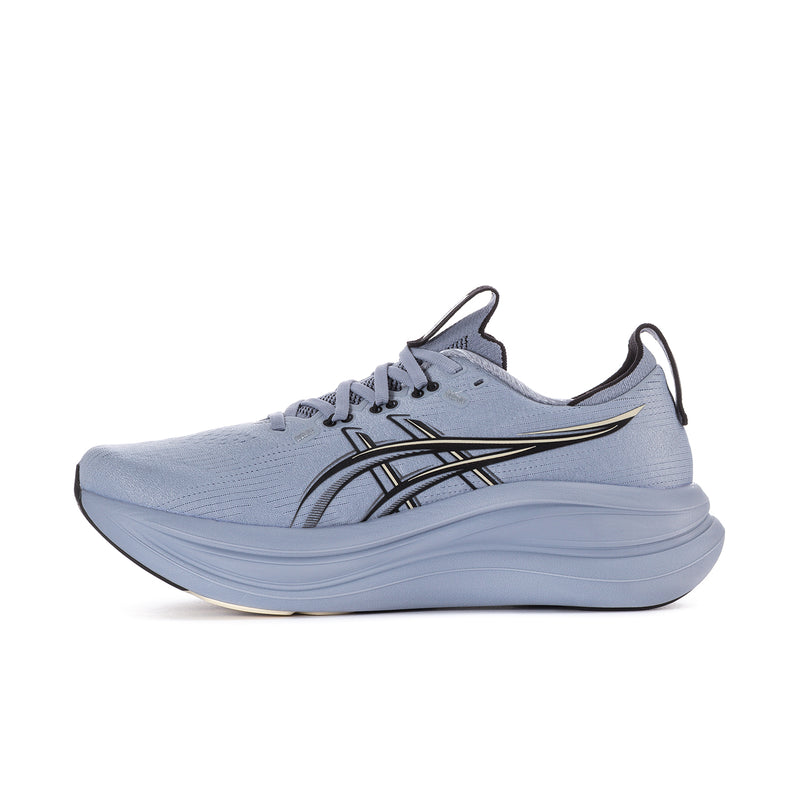 Men's running shoes, angled side view, light blue mesh with black stripe overlays