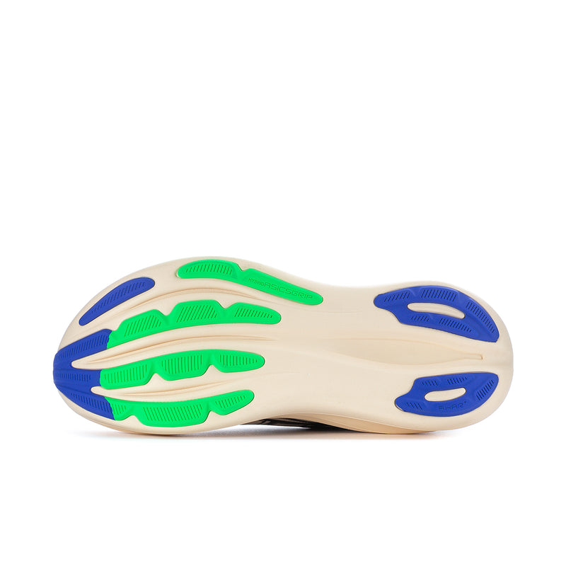 Shoe outsole, off-white with blue and green traction pods