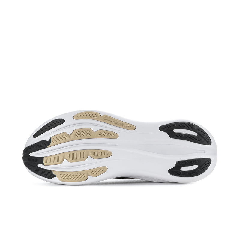 Men's outsole with white rubber and black-and-tan traction pads
