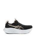 Women’s black running shoe with gold stripe details and white cushioned sole
