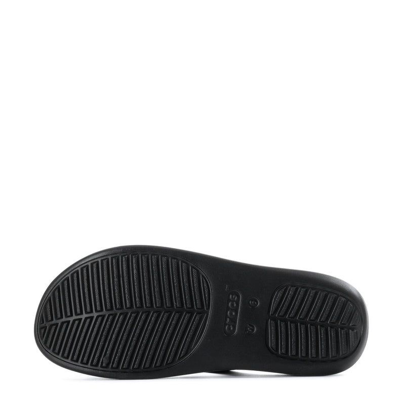 Black sandal outsole with rubber tread pattern and Crocs logo.