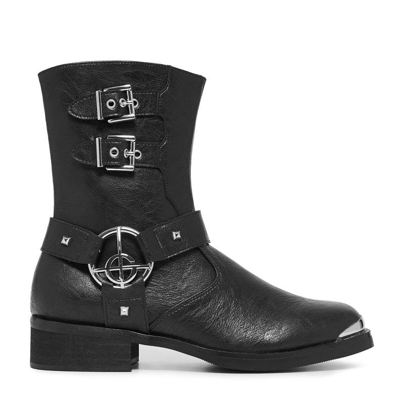 Black leather boot with silver buckles on a white background