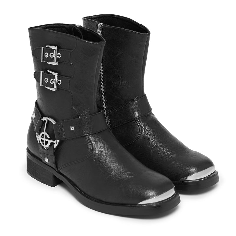 Black leather boots with metal buckles and details on a white background