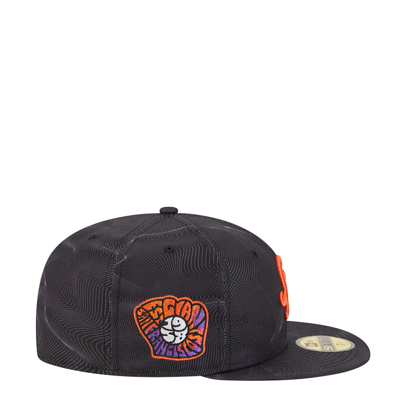 Dark baseball cap with side orange mascot patch and New Era flag on brim