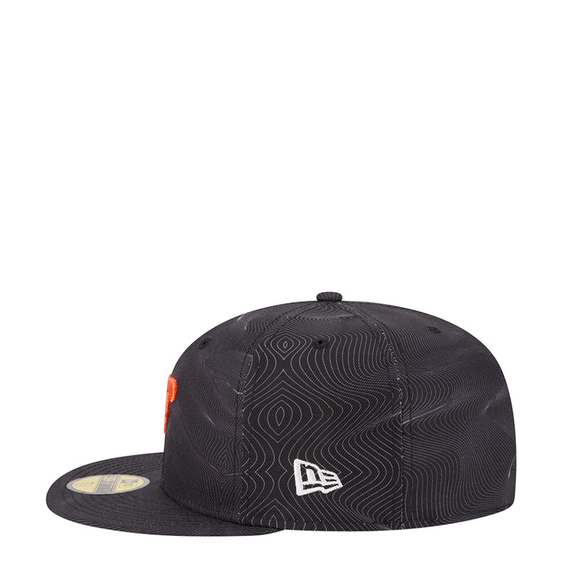 Dark baseball cap with New Era logo on front and orange side detailing