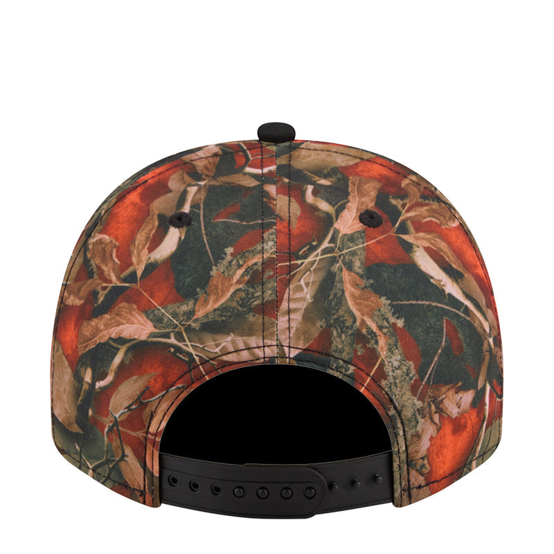 Two-tone A-frame cap showing full back in red/green leaf camo with adjustable strap