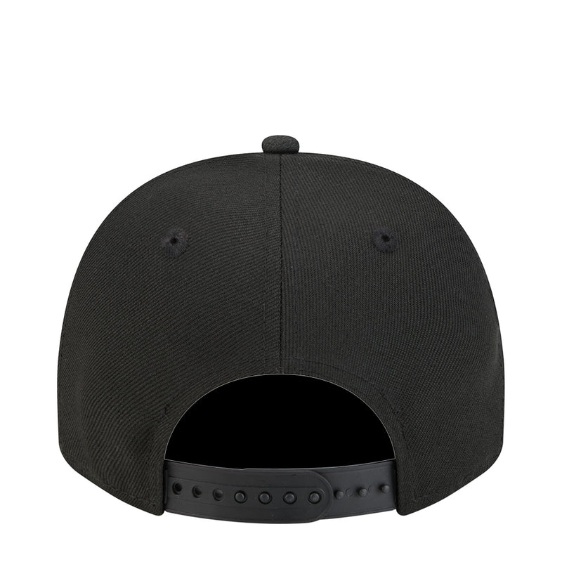 Youth black baseball cap showing open back snapback strap and ventilation holes.