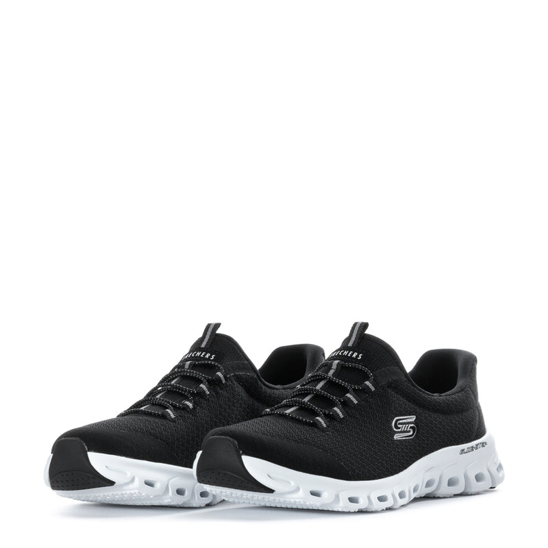 Pair of black knit women's sneakers with white pod-style soles and lace-up uppers