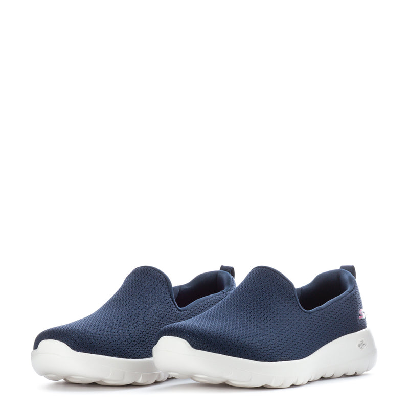 Women's navy slip-on sneakers shown as a pair with white soles