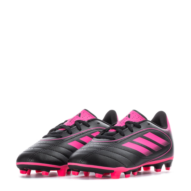 Kids black and pink soccer cleats, front close-up with molded studs