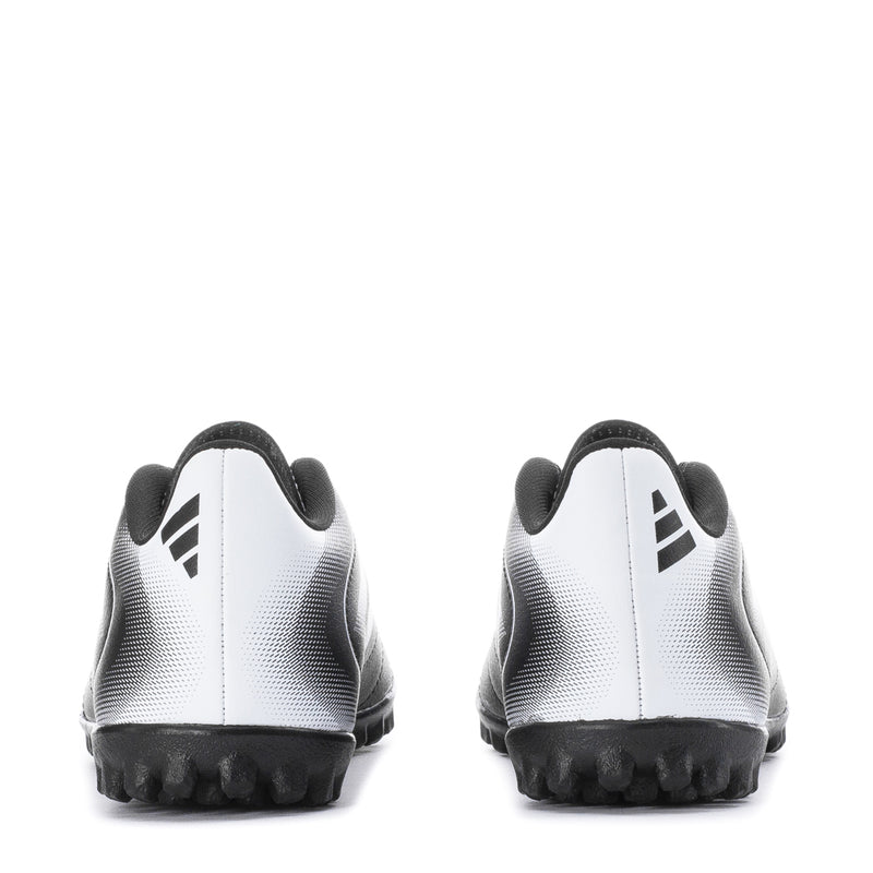 Kids black and white turf soccer cleats heel view with padded collar