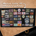 GORUCK medium patch board displaying 48 colorful rucking and event patches on a table.