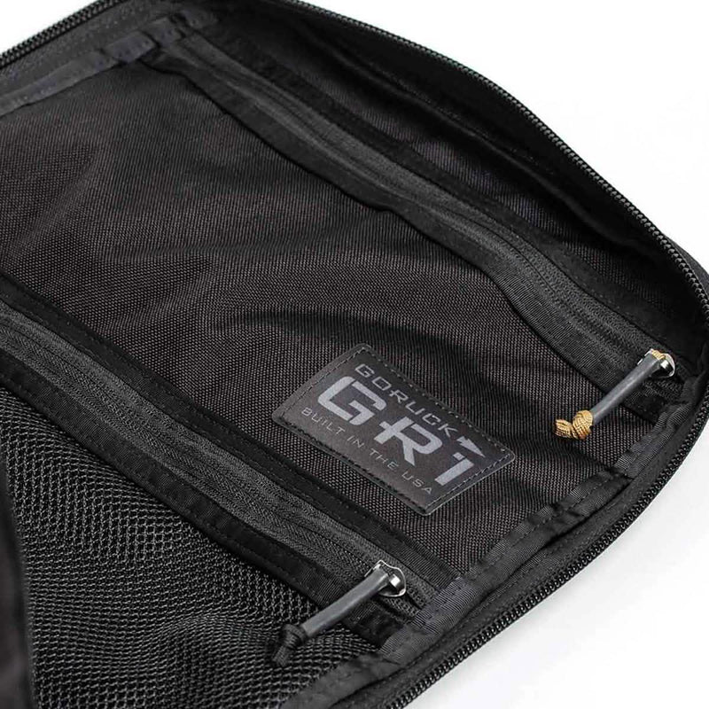 GORUCK GR1 backpack interior showing durable black mesh and zippered pockets