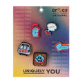 Five graffiti-style Crocs Jibbitz charms on display card