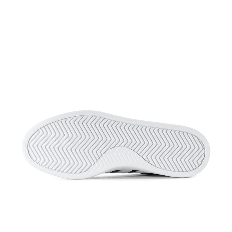 White rubber outsole with zigzag traction pattern for adidas sneakers
