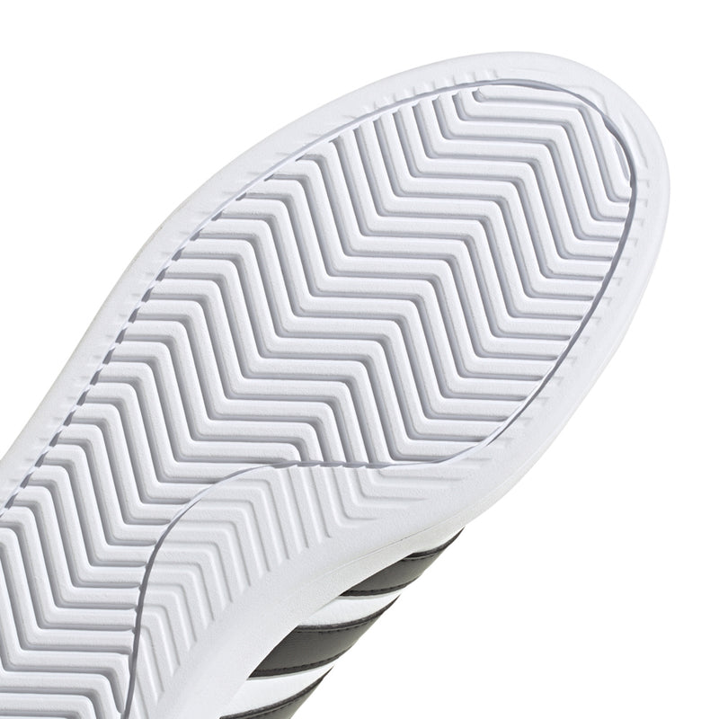 Men's white rubber outsole with zigzag herringbone tread pattern