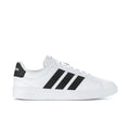 Men's white leather low-top sneakers with black adidas stripes and lace-up