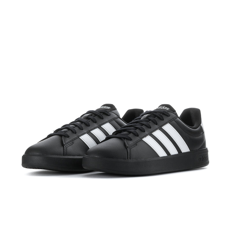 Men's black adidas low-top sneakers with white 3-Stripes and lace-up front