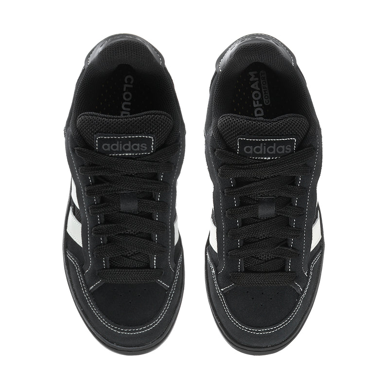 Black lace-up sneakers with cushioned tongue and logo patches