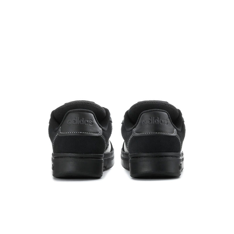 Rear view of black sneakers with heel tabs and cushioned back collar