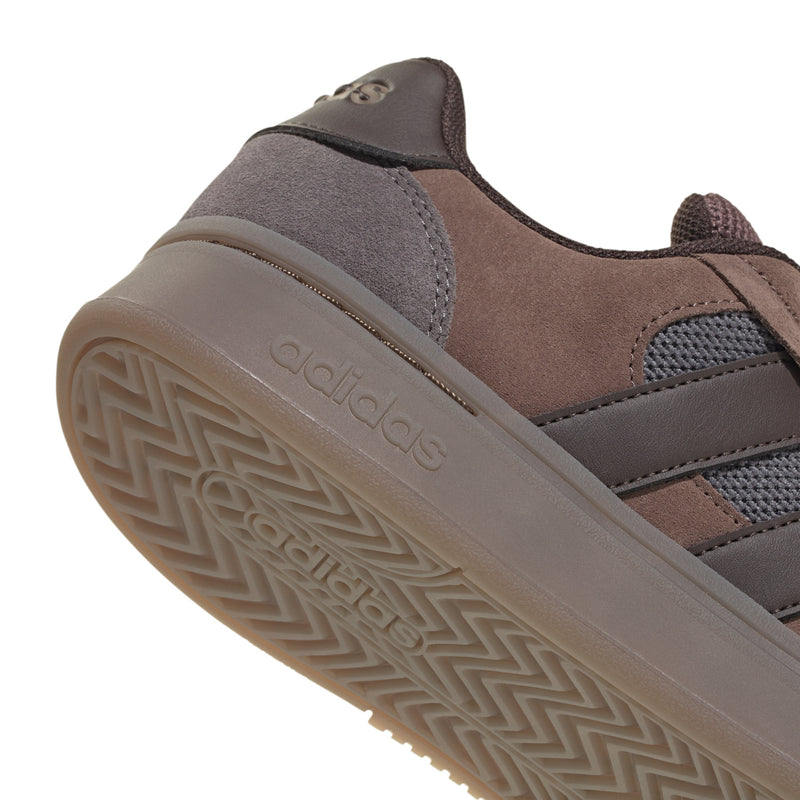 Men's adidas skate sneaker side and sole, textured tread with logo detail