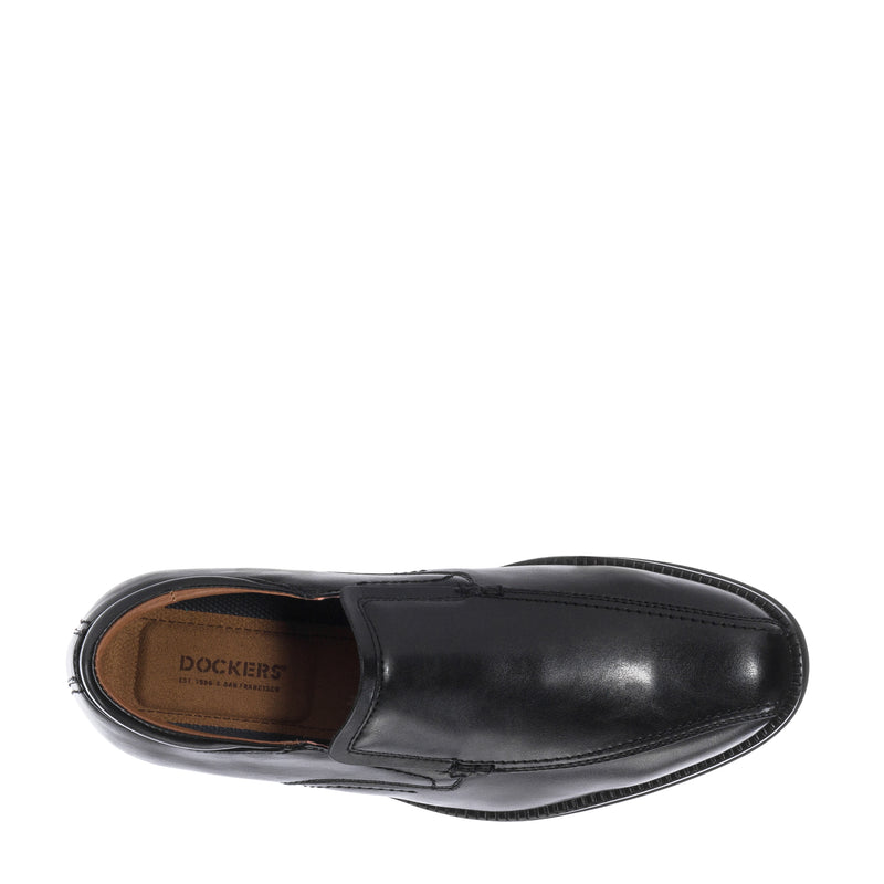 Black men's loafer shoe showing tan interior lining and stitched vamp