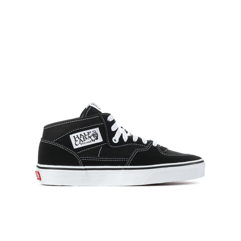 Youth black and white high-top sneaker with white laces and side stitching